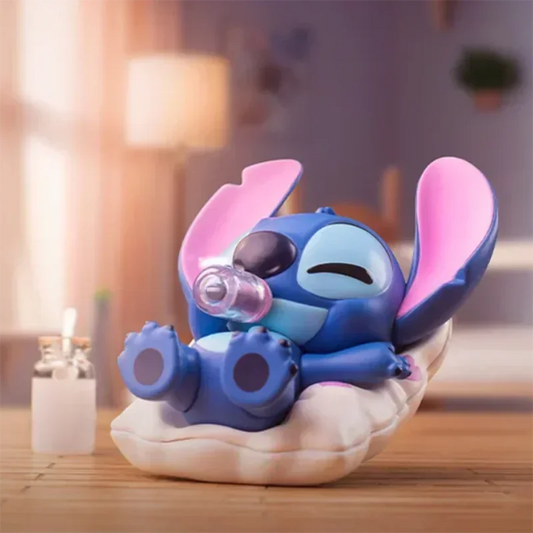 Figurine Stitch - Biberon et Coussin