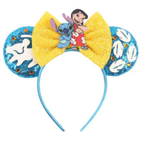 Lilo Tenant Stitch avec Nœud Jaune